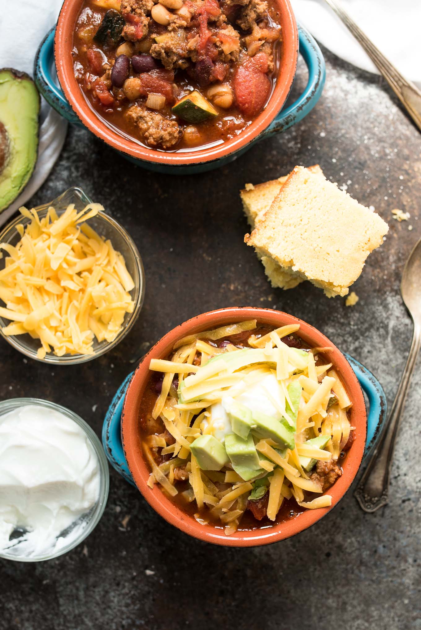turkey chili with cheese, avocado and sour cream 