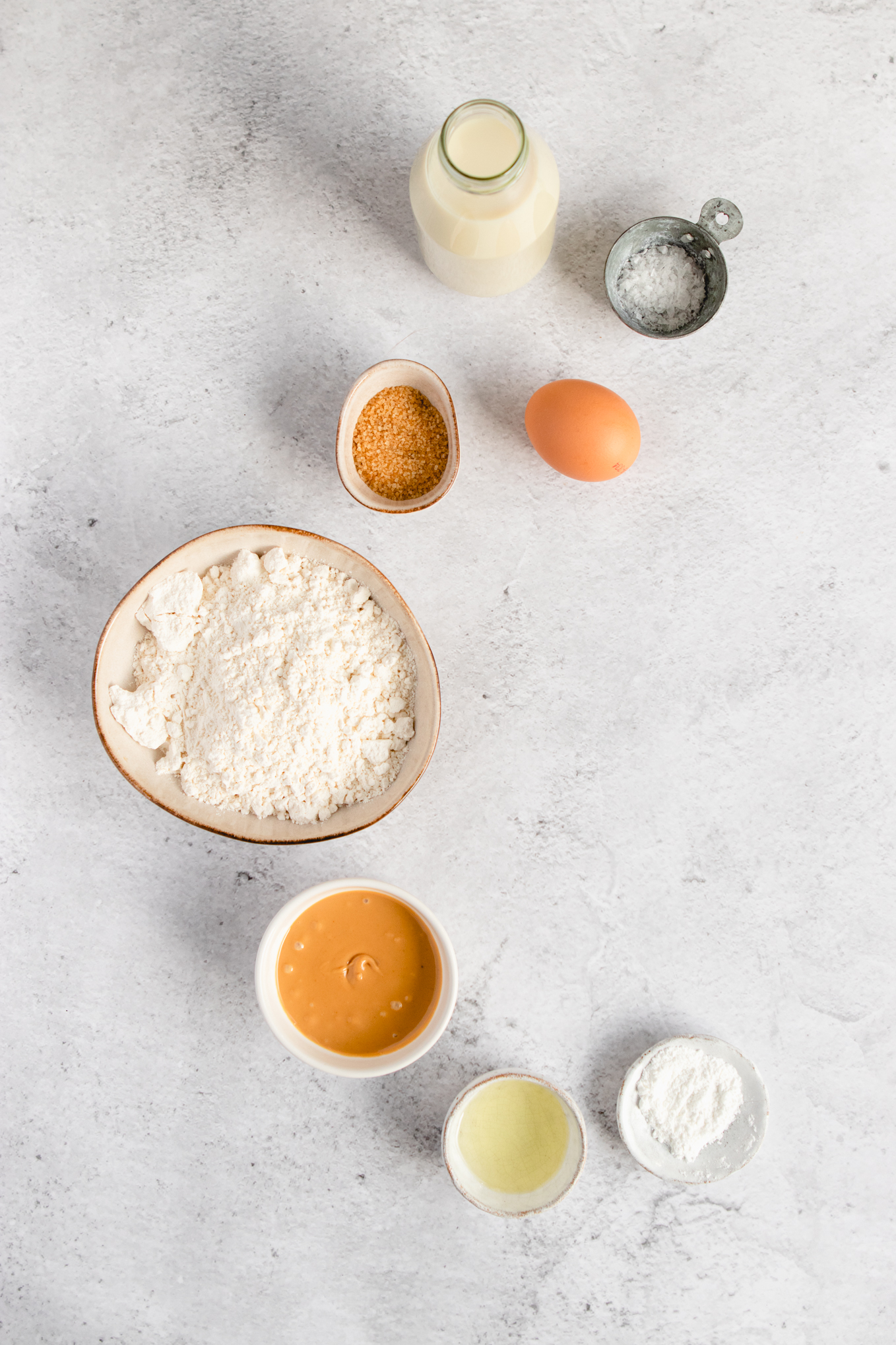 bowls of ingredients- flour, peanut butter, egg
