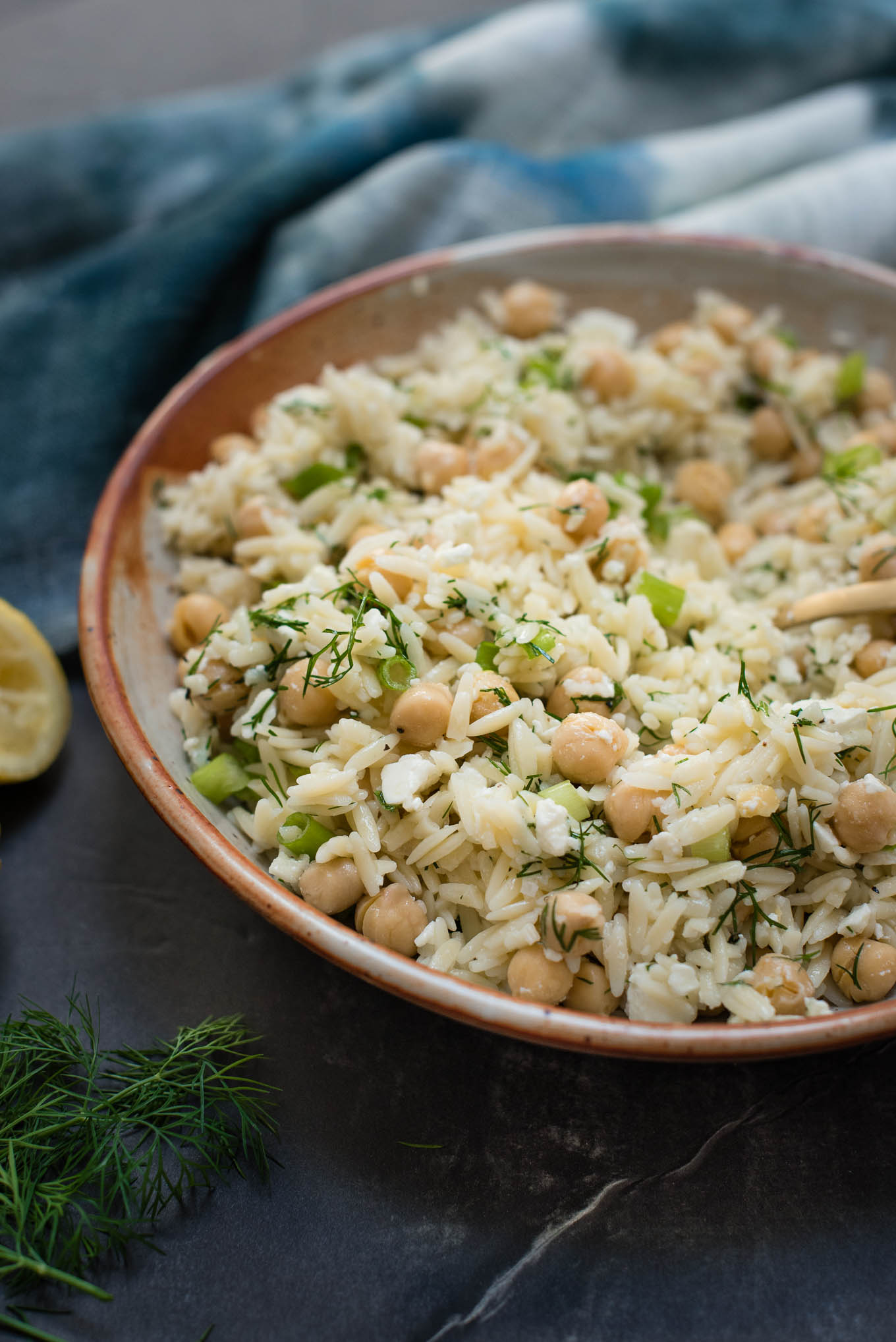 Orzo Chickpea Pasta Salad is a great summer side filled with feta, dill and lots of lemon.