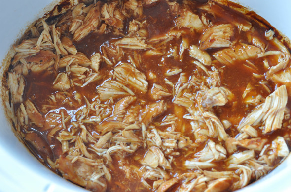 Slow Cooker BBQ Chicken- super simple and delicious. Use for sandwiches, tacos and more! | www.nutritiouseats.com