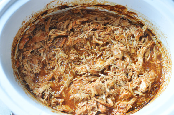 Slow Cooker BBQ Chicken- super simple and delicious. Use for sandwiches, tacos and more! | www.nutritiouseats.com