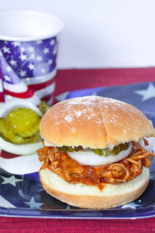 Slow Cooker BBQ Chicken- super simple and delicious. Use for sandwiches, tacos and more! | www.nutritiouseats.com