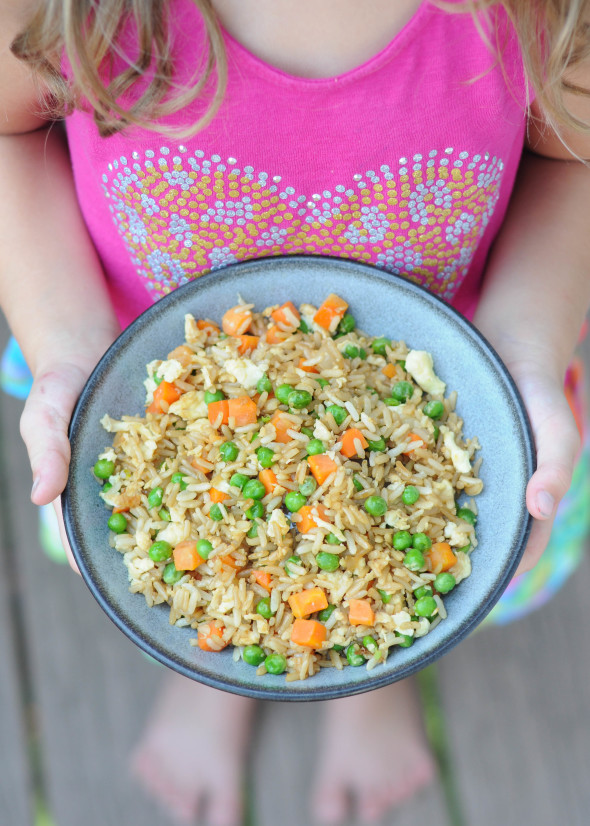 Get your kids in the kitchen by making this simple kid-friendly fried rice. Using leftover rice makes it even quicker! 