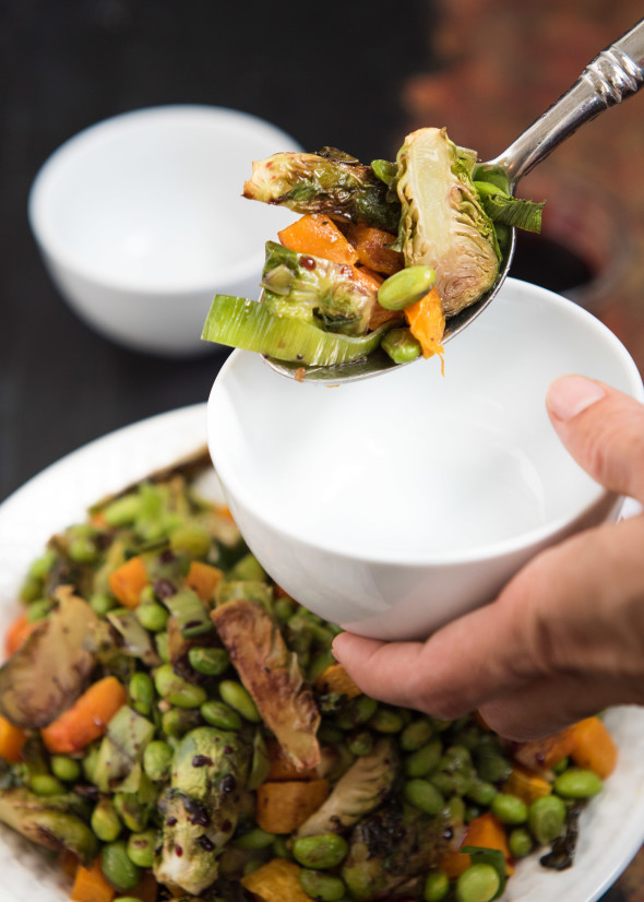 Roasted Edamame, Squash and Brussels Sprouts with Pomegranate Molasses- the perfect veggie side to bring to the Holiday table | Nutritious Eats