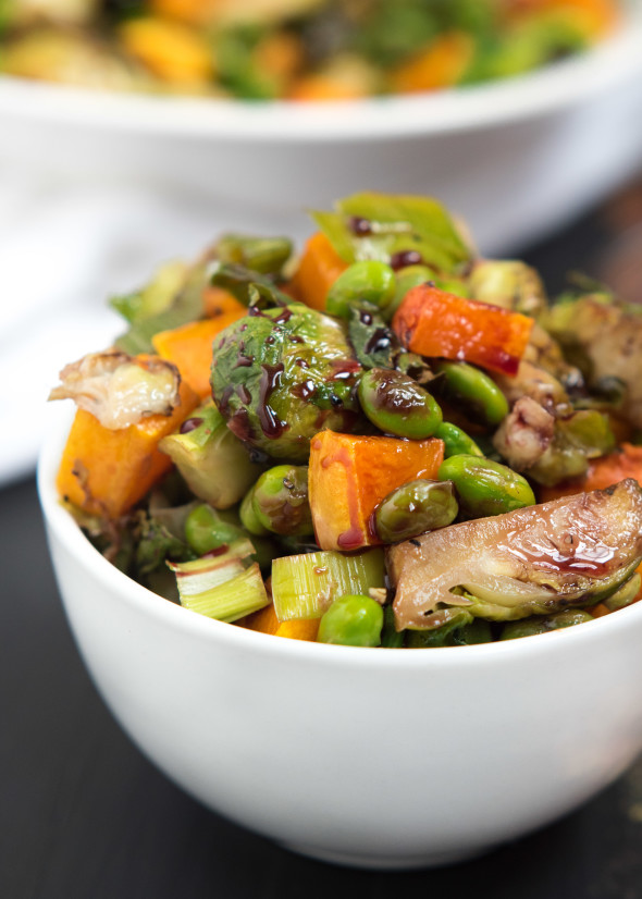 Roasted Edamame, Squash and Brussels Sprouts with Pomegranate Molasses- the perfect veggie side to bring to the Holiday table | Nutritious Eats