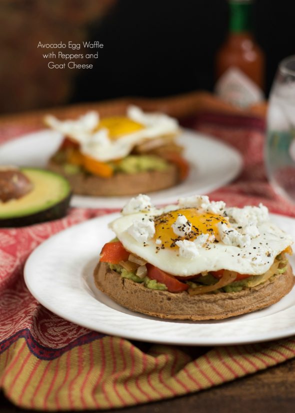 Avocado Egg Waffle with Peppers and Goat Cheese- who says waffles need syrup? These whole grain waffles plus avocado, veggies and egg make a filling and savory breakfast or brunch | www.nutritiouseats.com