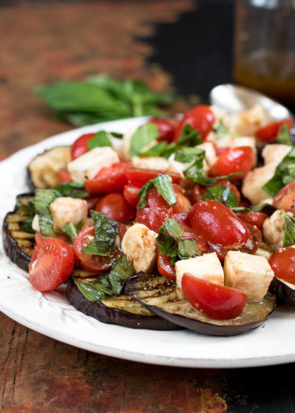 Caprese Salad Over Grilled Eggplant- a delicious summer side to pair with any meal #glutenfree | www.nutritiouseats.com