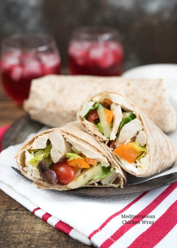 Mediterranean Chicken Wrap- Greek Salad, hummus and seasoned chicken make up this tasty wrap. Great for leftovers or a make-ahead meal! | www.nutritiouseats.com