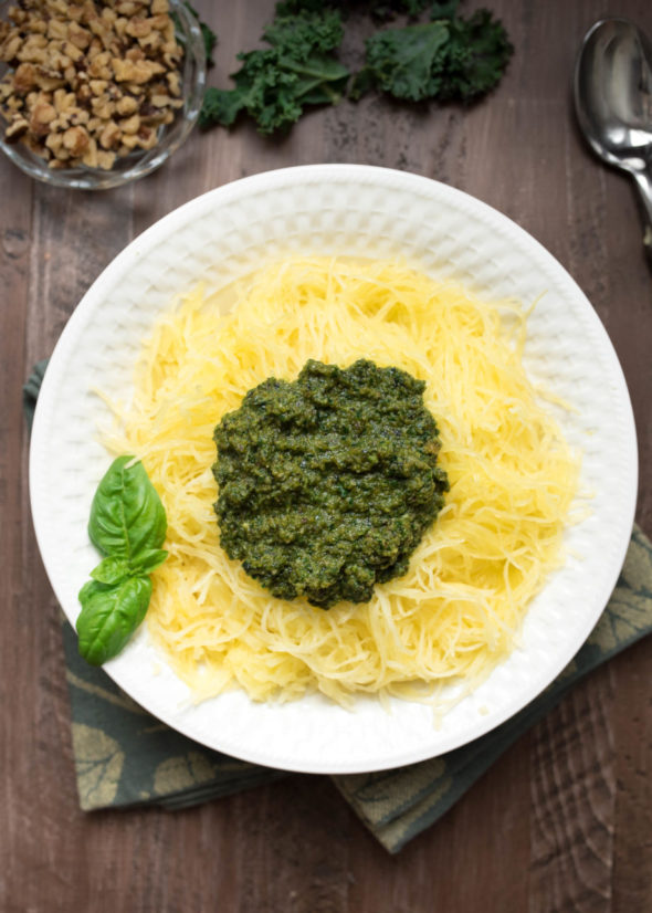 Vegan Pesto Spaghetti Squash- pesto is ready in less than 5 minutes! Pairs perfectly with a spaghetti squash for a nutritious side. | www.nutritiouseats.com