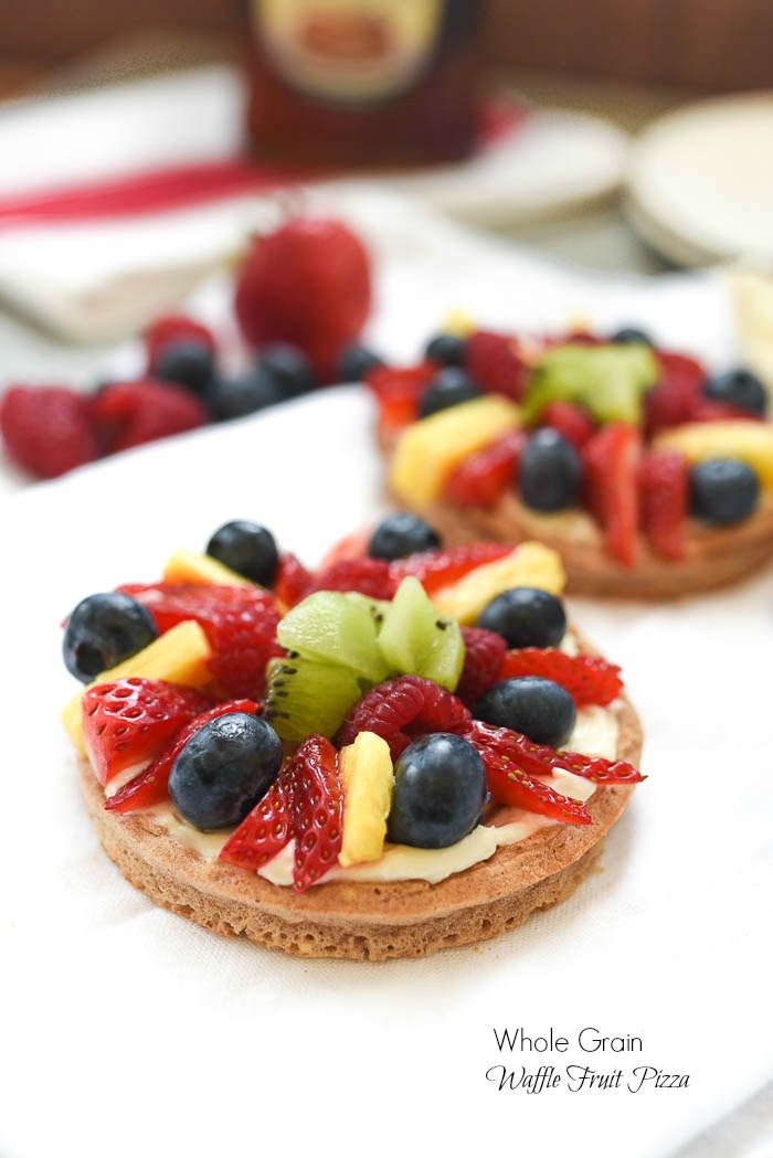 Whole Grain Waffle Fruit Pizza- this simple and fun balanced breakfast is great way to jazz up your waffles. Topped with whipped vanilla cream cheese and all the fruit! #glutenfree | www.nutritiouseats.com