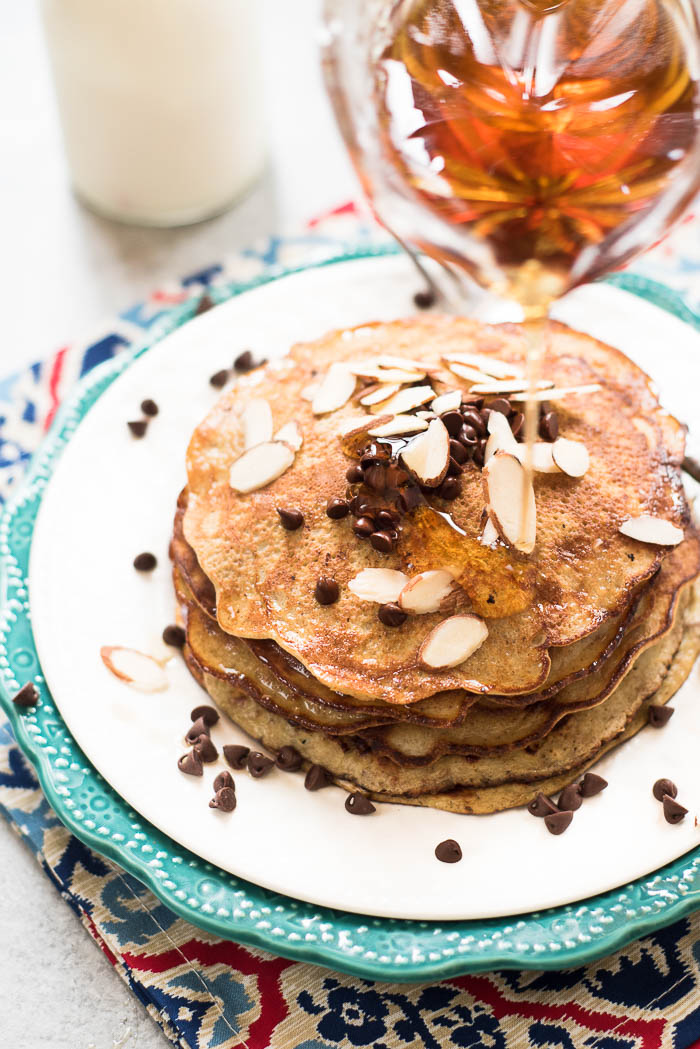 3 Ingredient Grain-Free Pancakes- high protein, dairy free, super simple to make. Top with your choice of toppings for a gluten-free, Paleo friendly breakfast! | www.nutritiouseats.com