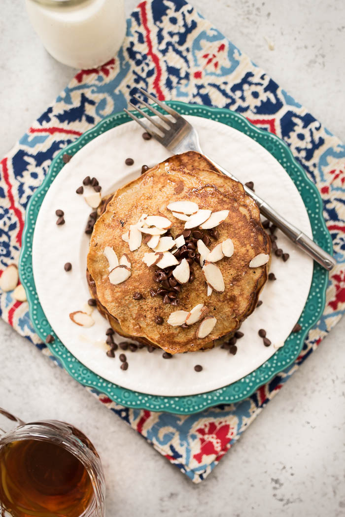 3 Ingredient Grain-Free Pancakes- high protein, dairy free, super simple to make. Top with your choice of toppings for a gluten-free, Paleo friendly breakfast! | www.nutritiouseats.com