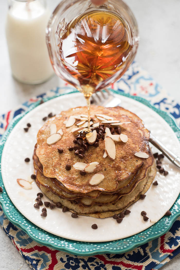 3 Ingredient Grain-Free Pancakes- high protein, dairy free, super simple to make. Top with your choice of toppings for a gluten-free, Paleo friendly breakfast! | www.nutritiouseats.com