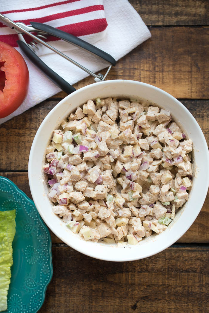 Cumin Chicken Salad Stuffed Tomatoes- delicious spiced chicken salad that can be enjoyed on bread, crackers or stuffed in an avocado, tomato or lettuce! #glutenfree | www.nutritiouseats.com