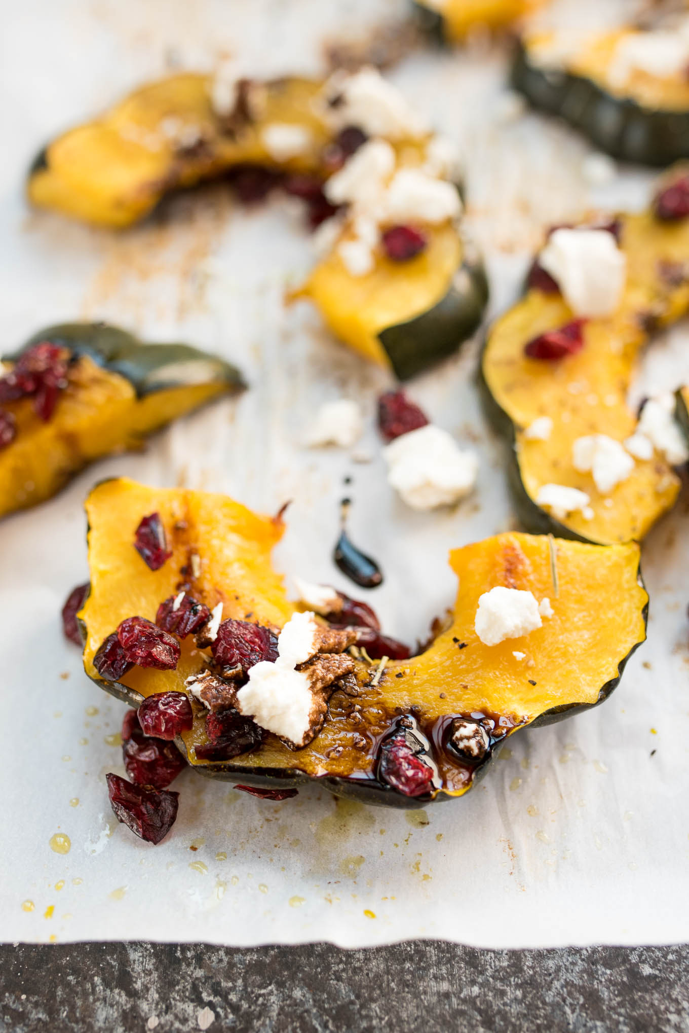 Roasted Acorn Squash with Cranberries, Goat Cheese and Balsamic Glaze #glutenfree #vegetarian side that will be perfect on your Holiday table | www.nutritiouseats.com 