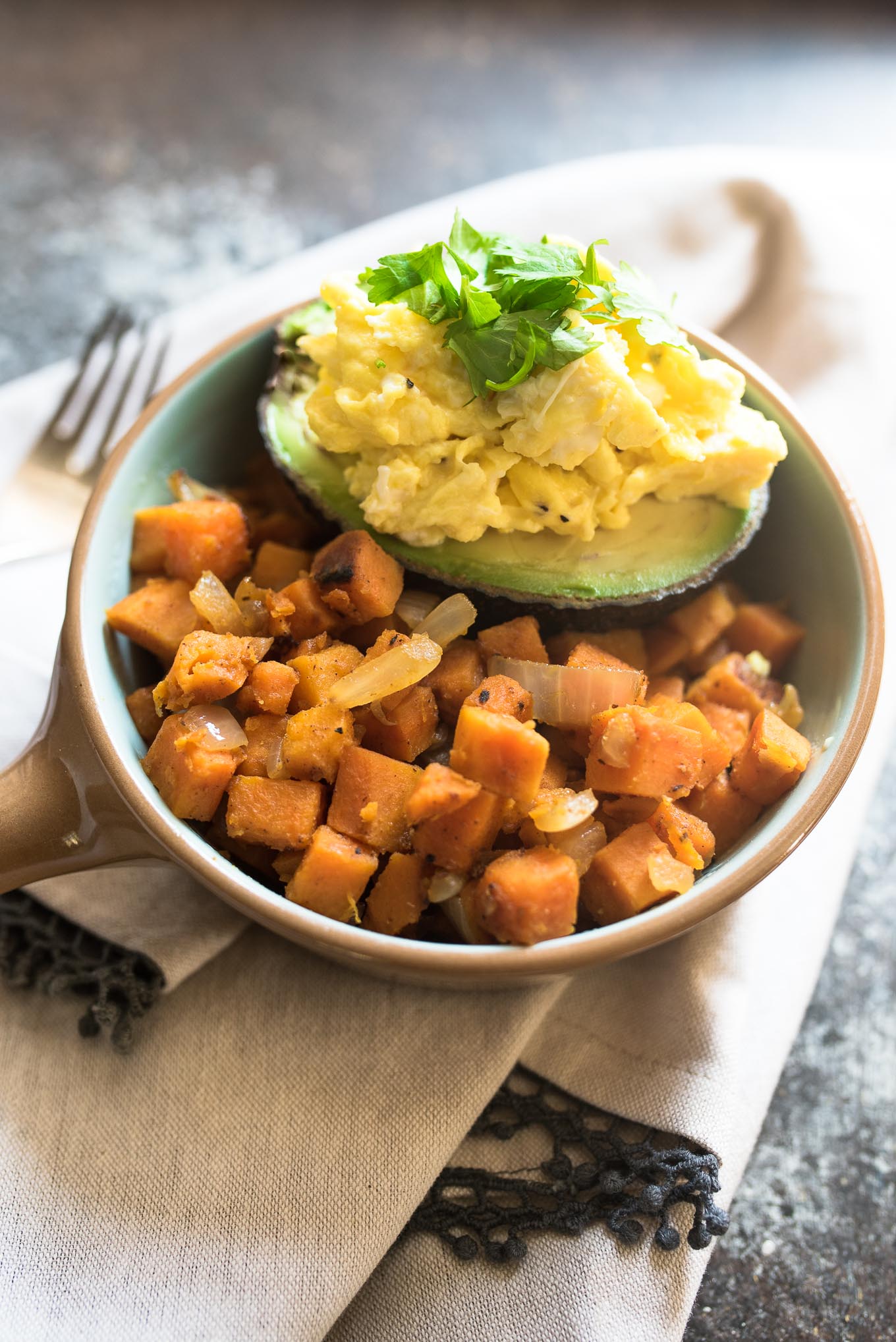 Spiced Sweet Potato Hash with Avocado and Eggs is naturally gluten free, high in fiber and protein and is a budget friendly meal that will nourish you inside and out!