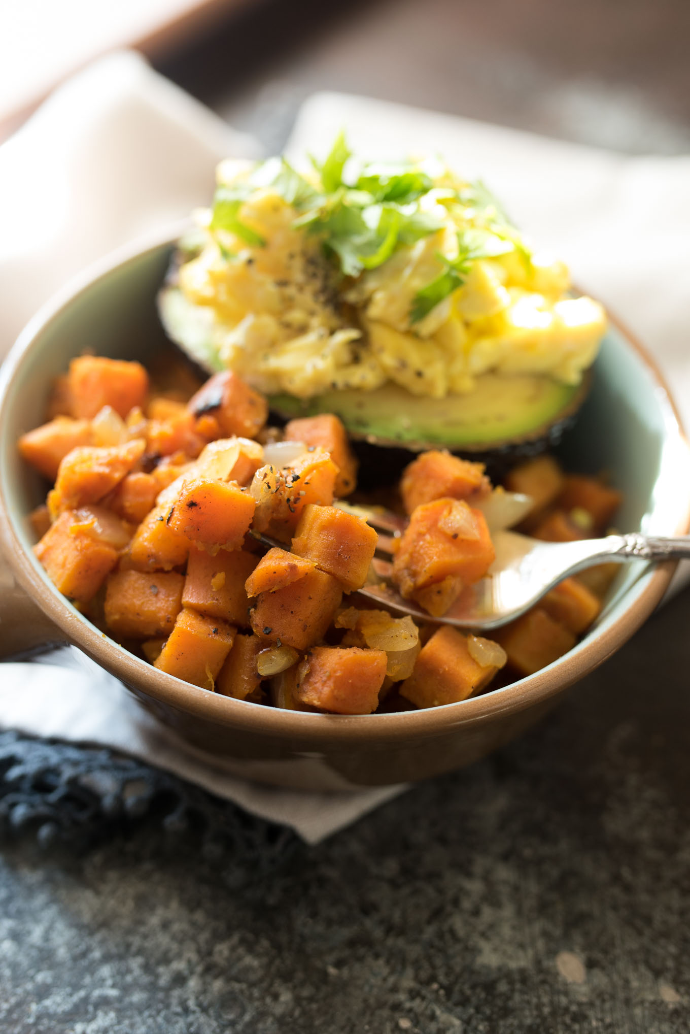 Spiced Sweet Potato Hash with Avocado and Eggs is naturally gluten free, high in fiber and protein and is a budget friendly meal that will nourish you inside and out!