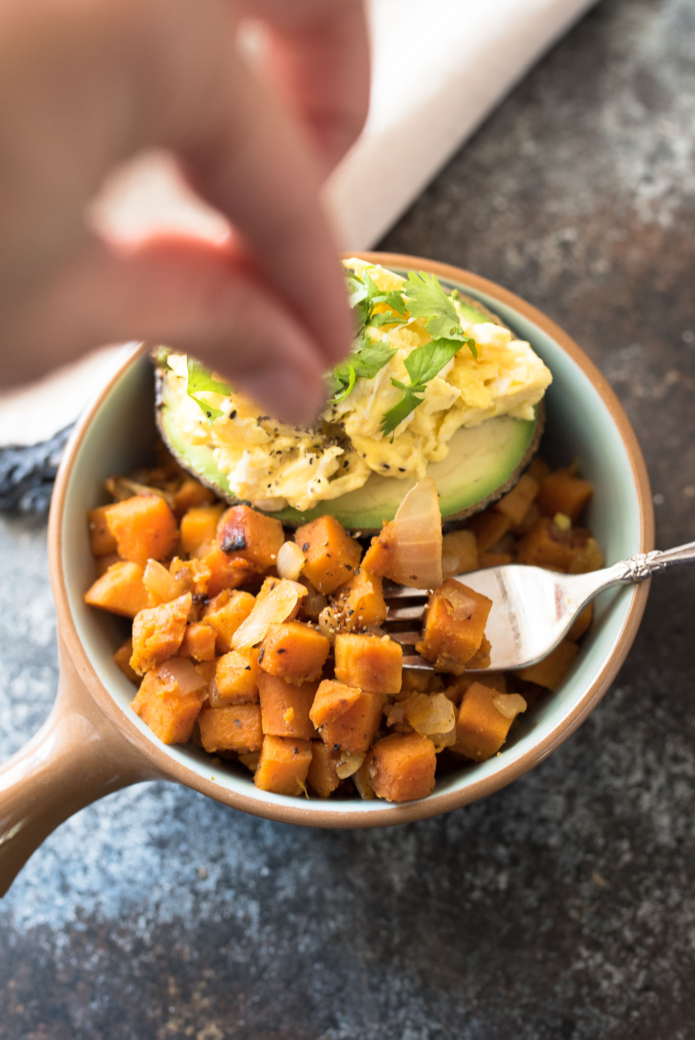Spiced Sweet Potato Hash with Avocado and Eggs is naturally gluten free, high in fiber and protein and is a budget friendly meal that will nourish you inside and out!