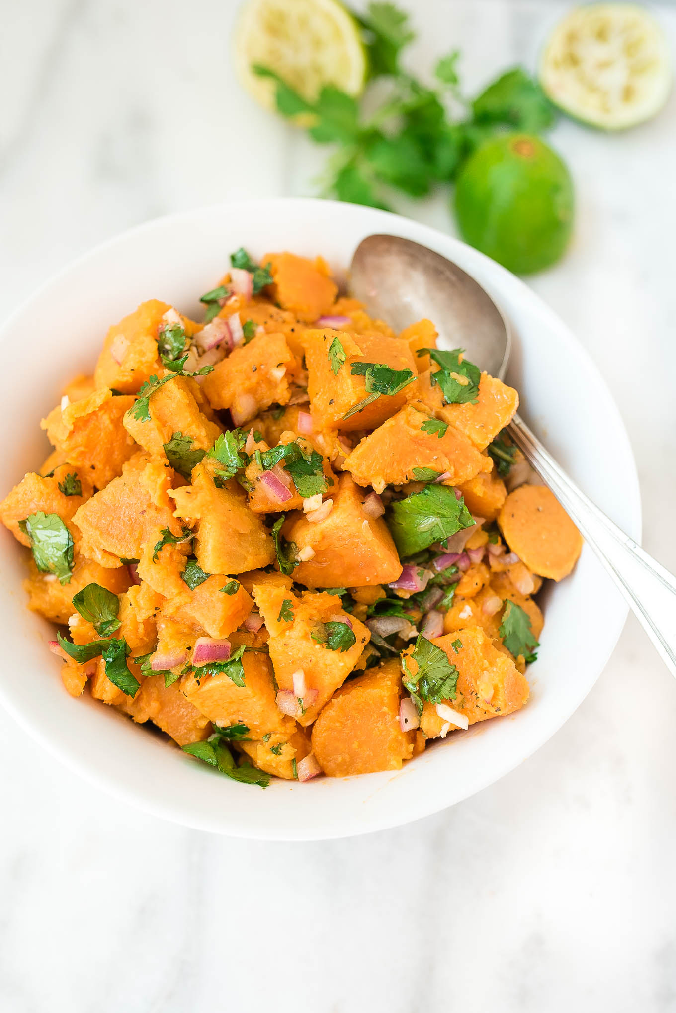Cilantro Lime Sweet Potato Salad is bursting with flavor from the sweet potatoes and the garlicky and citrus dressing- it's a match made in heaven!