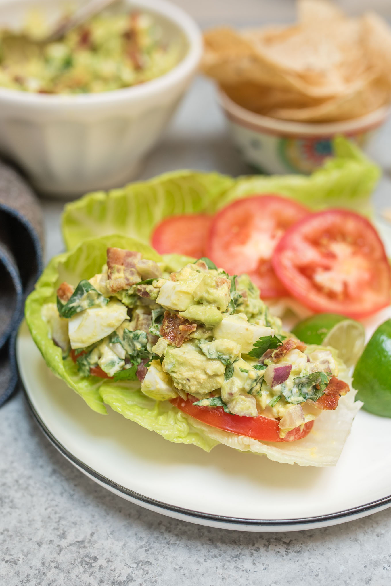 Guacamole Egg Salad tastes like that perfect guacamole recipe, but a little heartier with the addition of eggs and bacon. It makes a great dip, sandwich or salad topping.