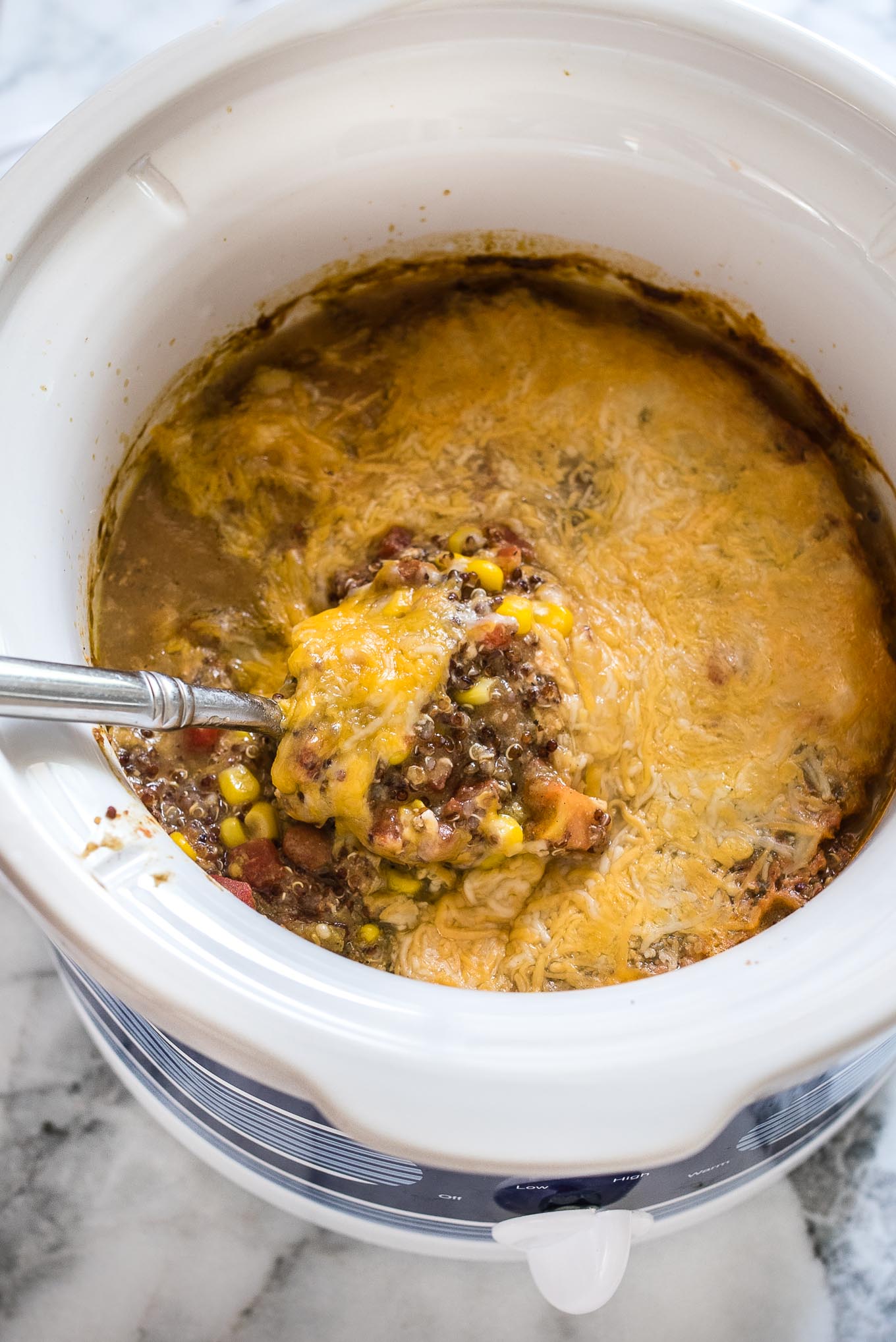 Slow Cooker Tex-Mex Quinoa is a gluten free, vegetarian meal that is a breeze to throw together and is packed with long lasting plant protein.