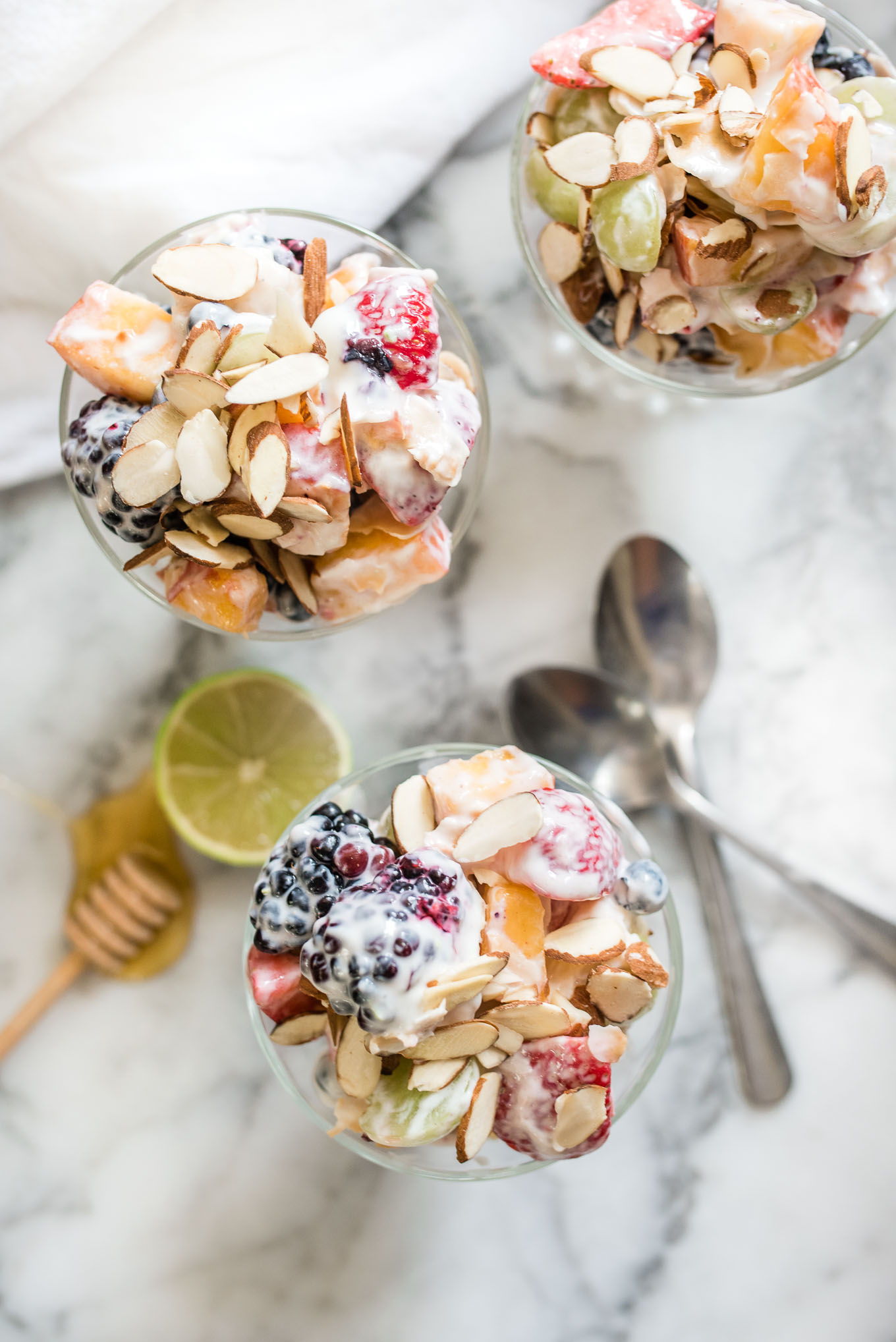 Fruit Salad with Lime Yogurt Dressing is a tangy sweet side dish and is a perfect gluten-free addition to a light breakfast, potluck or brunch.