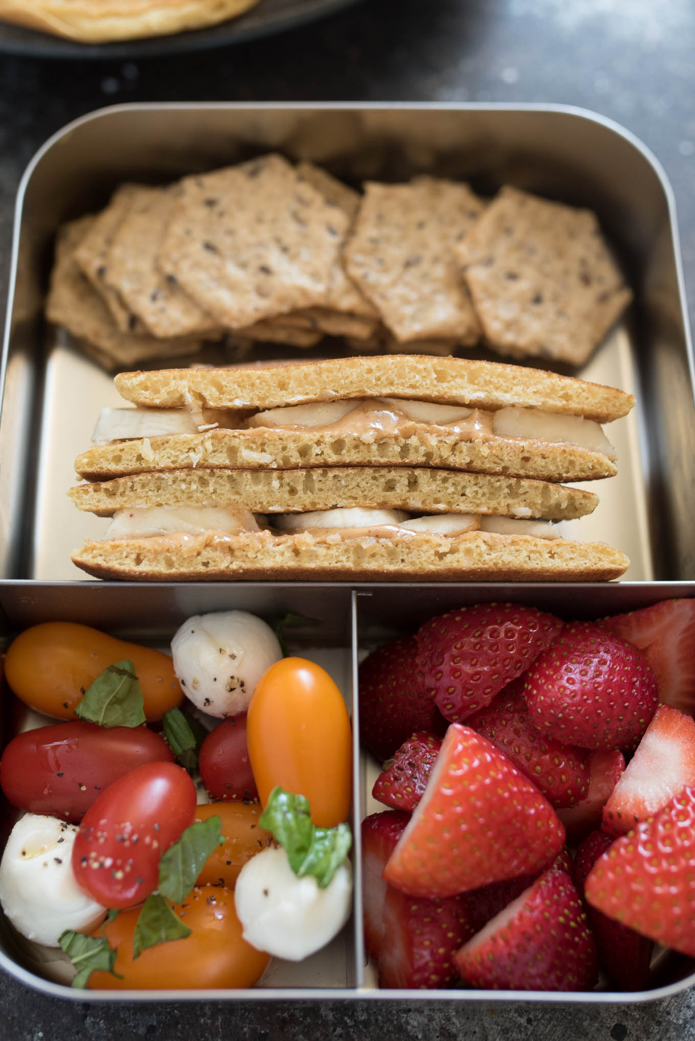 Enjoy these 10 nutritious, well-balanced, kid (and adult) friendly lunch box ideas that will inspire you to get packing! Plus a fun Pancake Sandwich recipe that your kids will love.