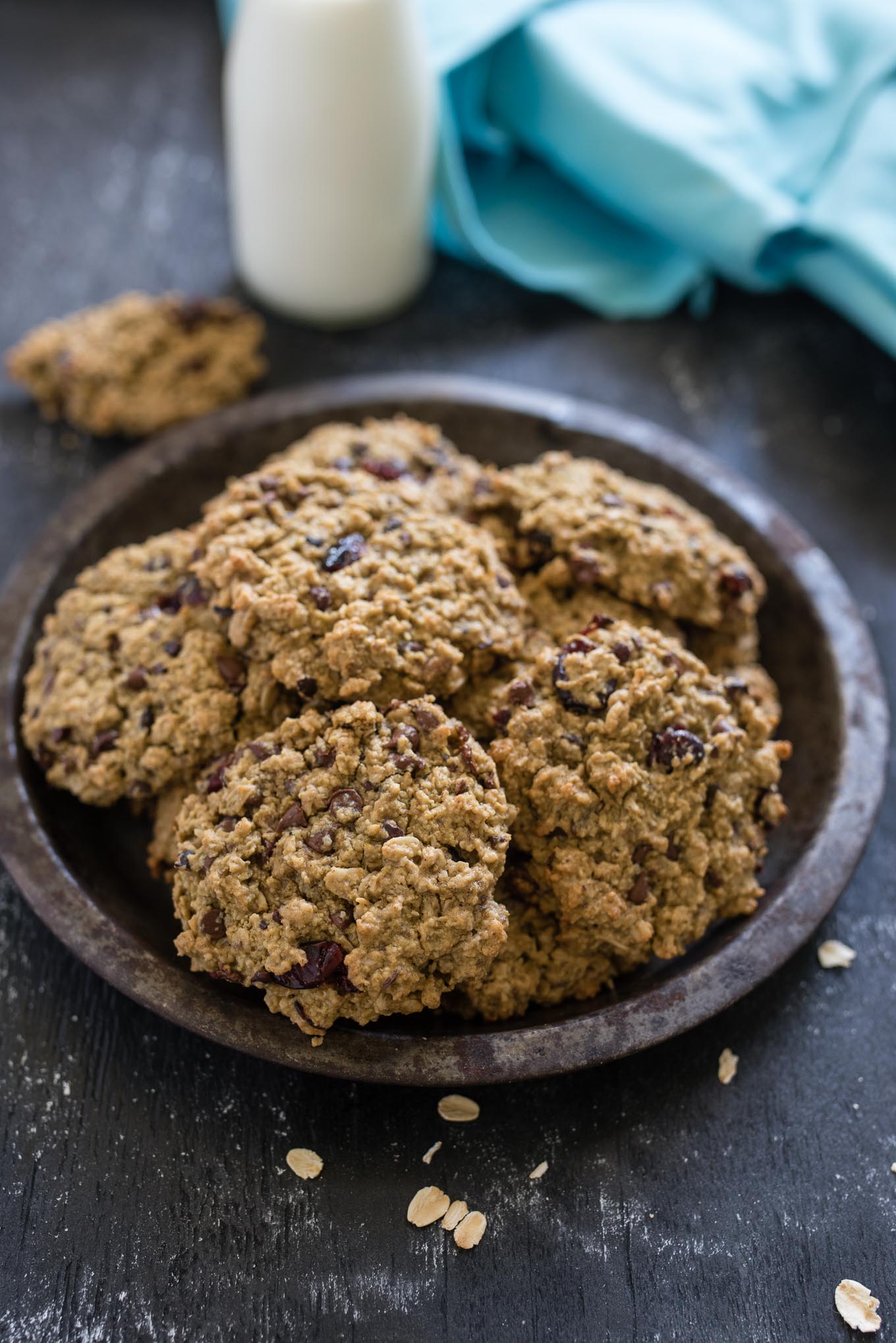 Lunch Box Cookies are both nutritious and delicious- a hearty soft cookie packed with oats, chocolate chips, cranberries , cocoa nibs and reduced amounts of sugar and oil.