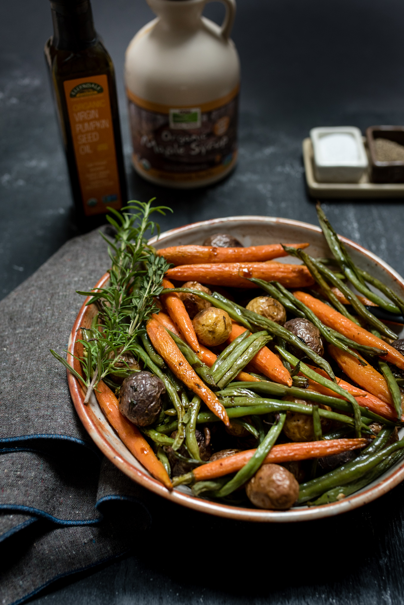 Herb Roasted Potatoes and Vegetables with Pumpkin Seed Vinaigrette, easy to make and naturally gluten free, great to serve along with roast beef, lamb, fish or to add to your vegetarian menu.