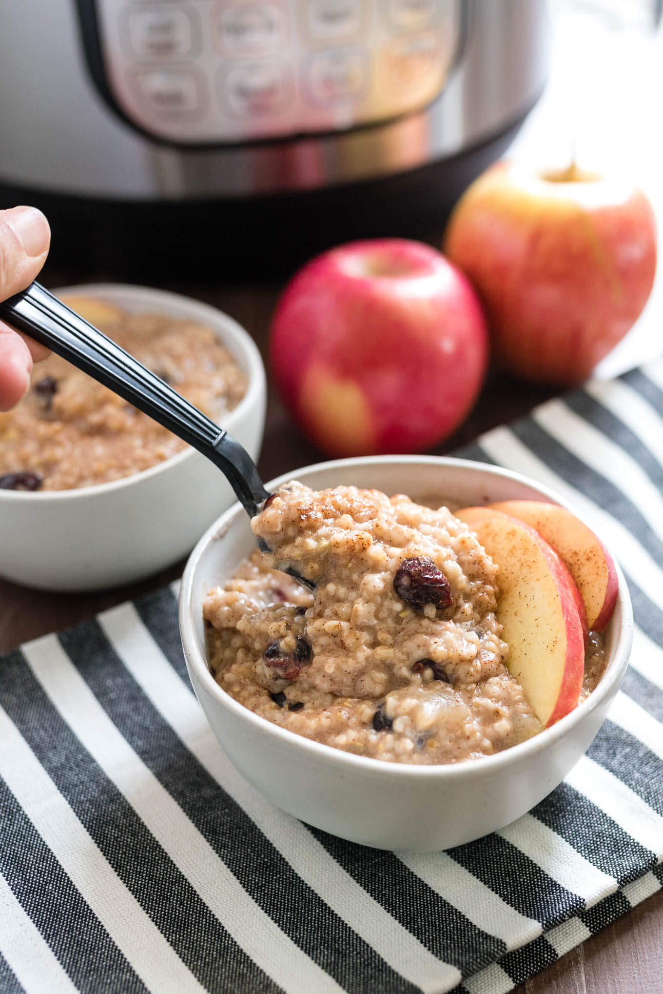 Instant Pot Apple Cranberry Steel Cut Oats are extra creamy and flavorful and you don't have to babysit the stovetop!