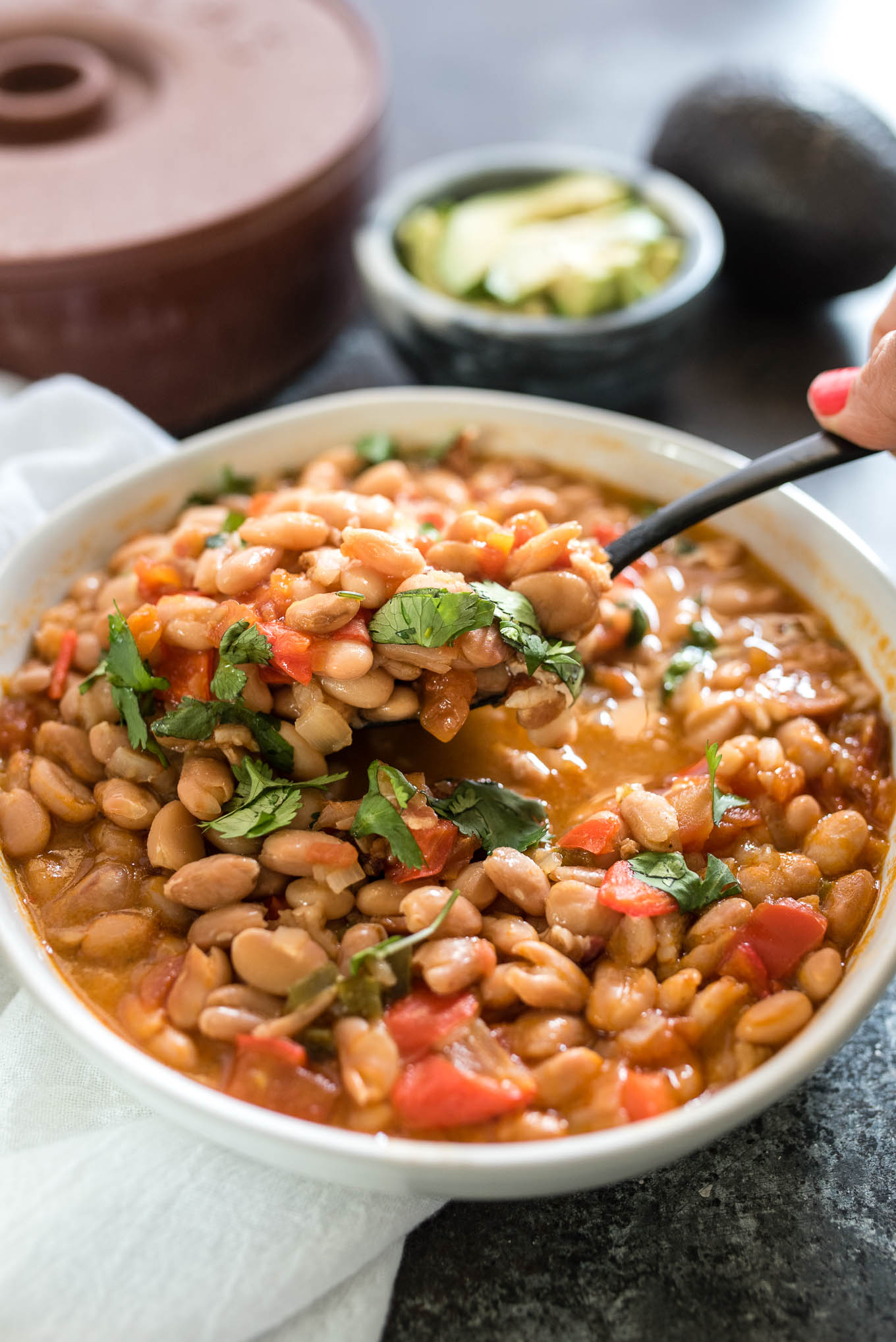 Instant Pot Borracho Beans, aka Frijoles Borrachos are the perfect Mexican style beans infused with flavor from the pressure cooker.