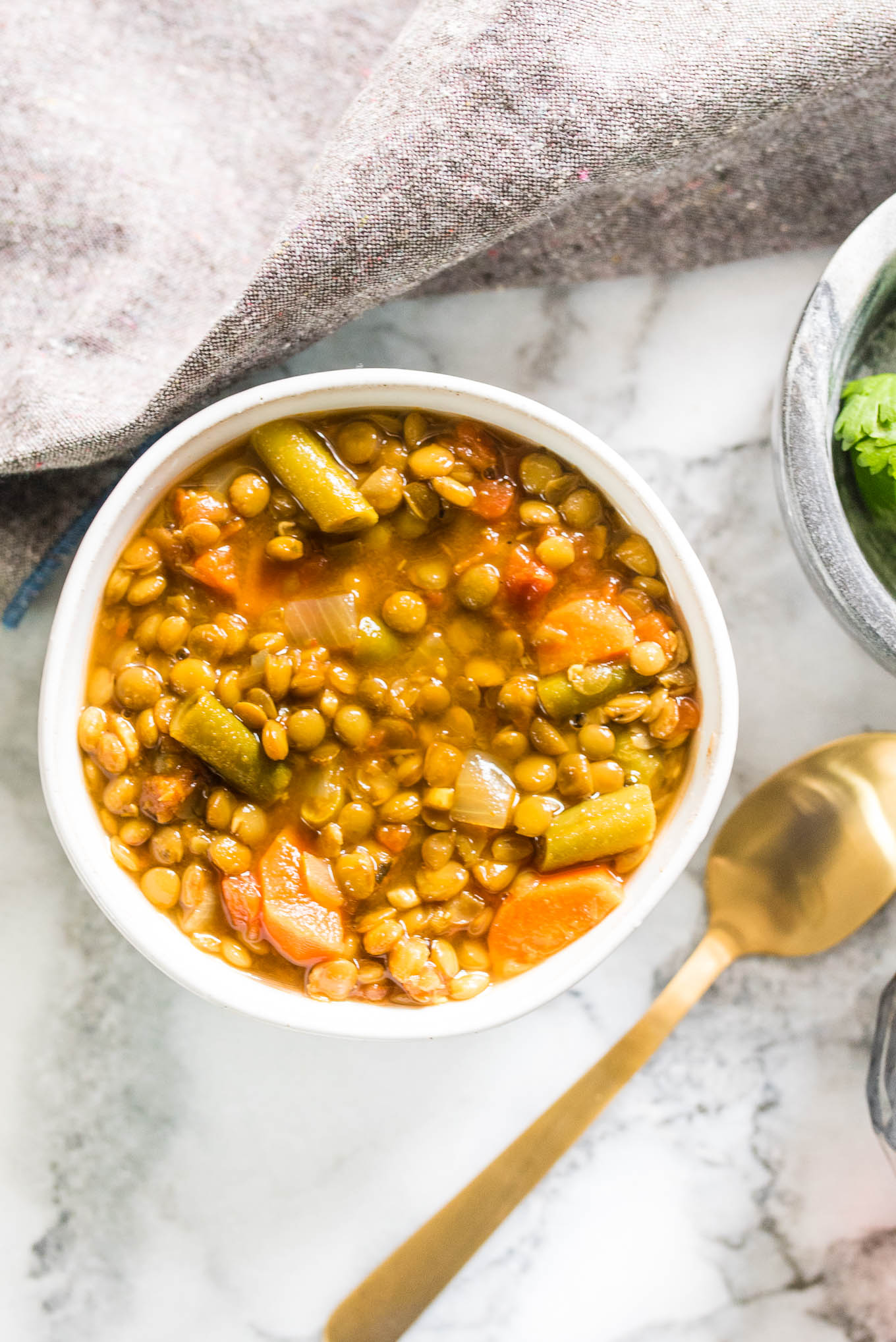 The Easiest Curried Lentil soup is vegan, protein packed and naturally gluten free. Perfect for a simple meatless meal.