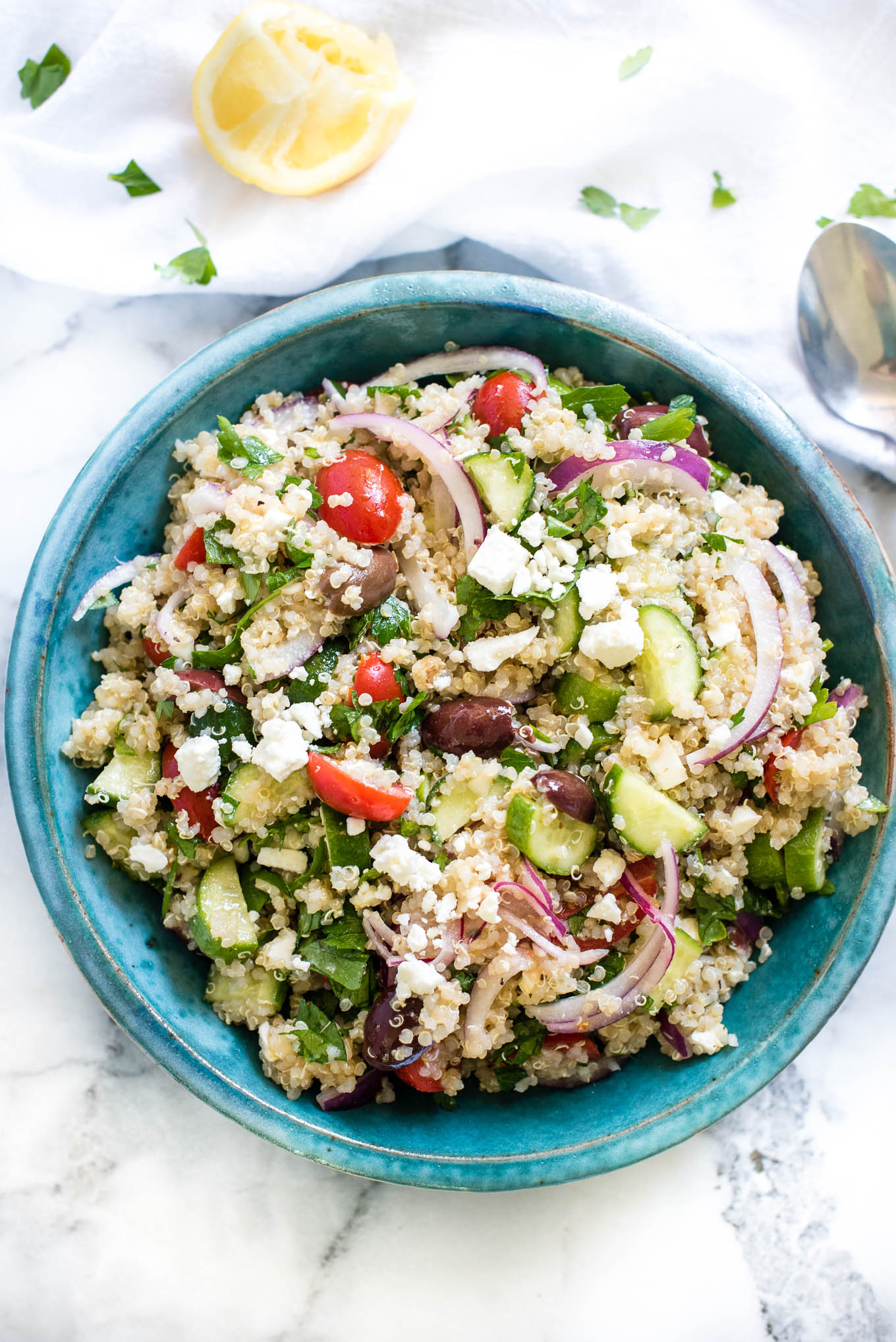 Greek Quinoa Salad is bursting with Mediterranean flavors and is a great make-ahead vegetarian and gluten free salad.