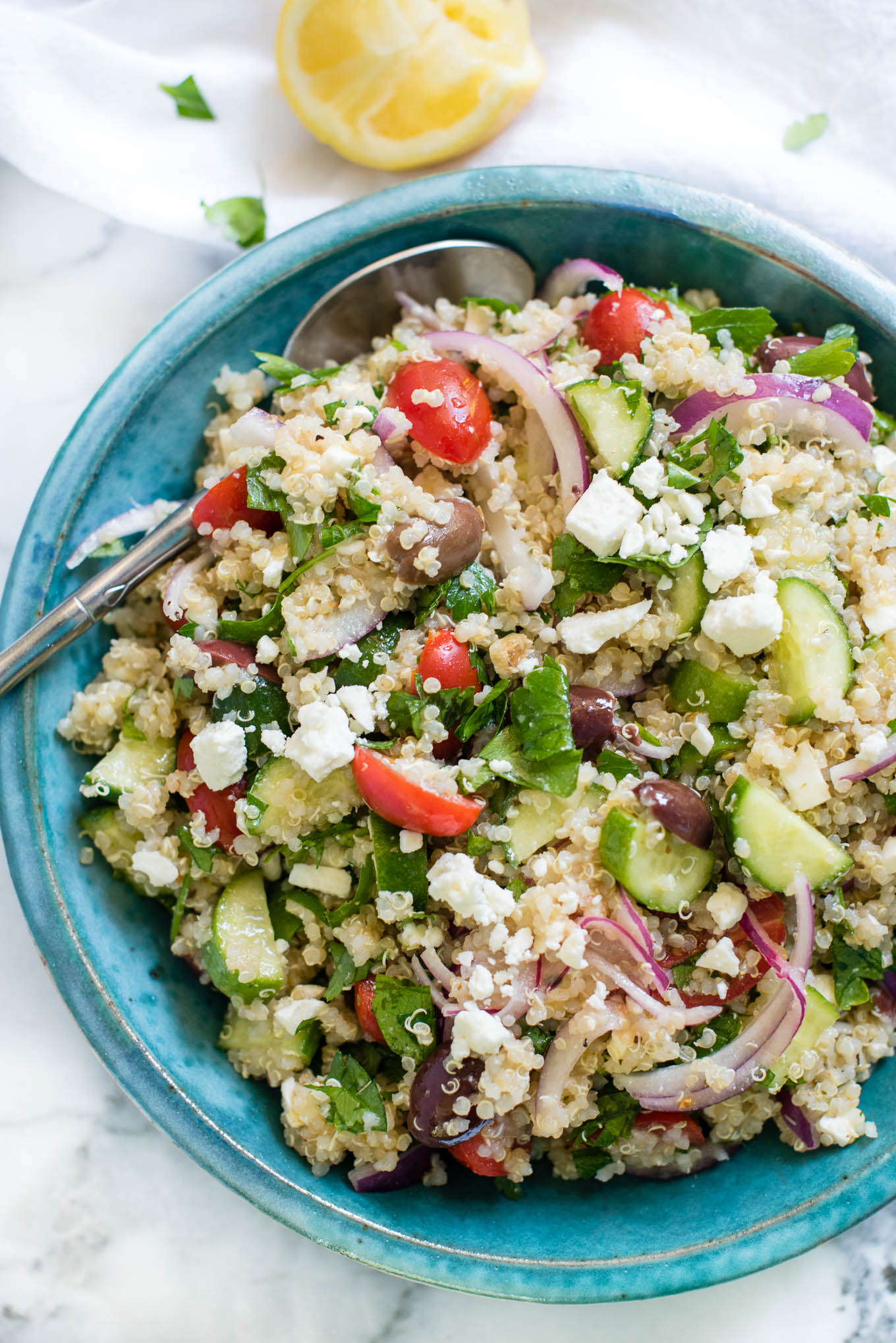 Greek Quinoa Salad is bursting with Mediterranean flavors and is a great make-ahead vegetarian and gluten free salad.