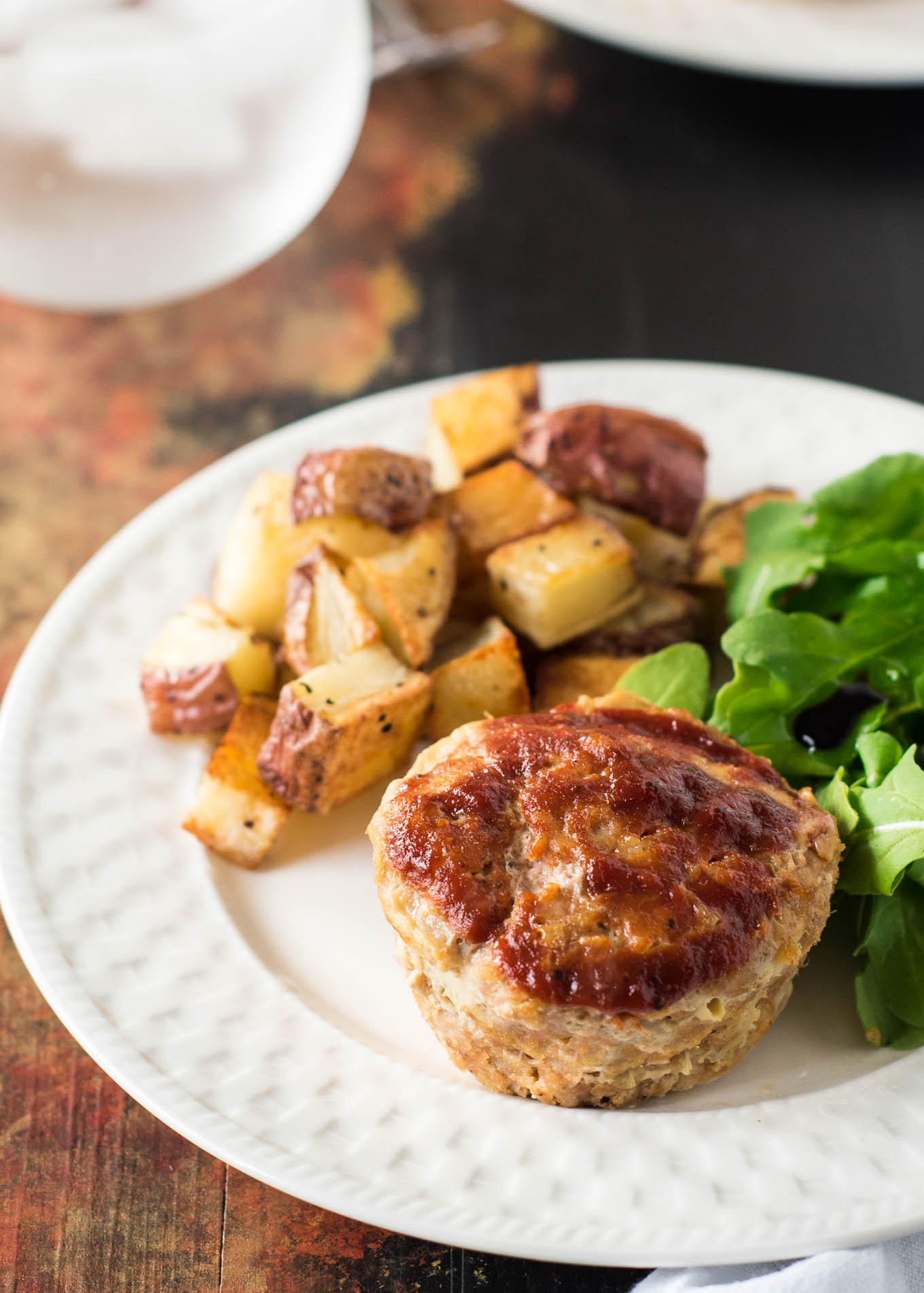 Turkey Meatloaf Muffins are high protein, individual portions of your favorite comfort food, lightened up a bit- a great kid-friendly or meal prep dish.