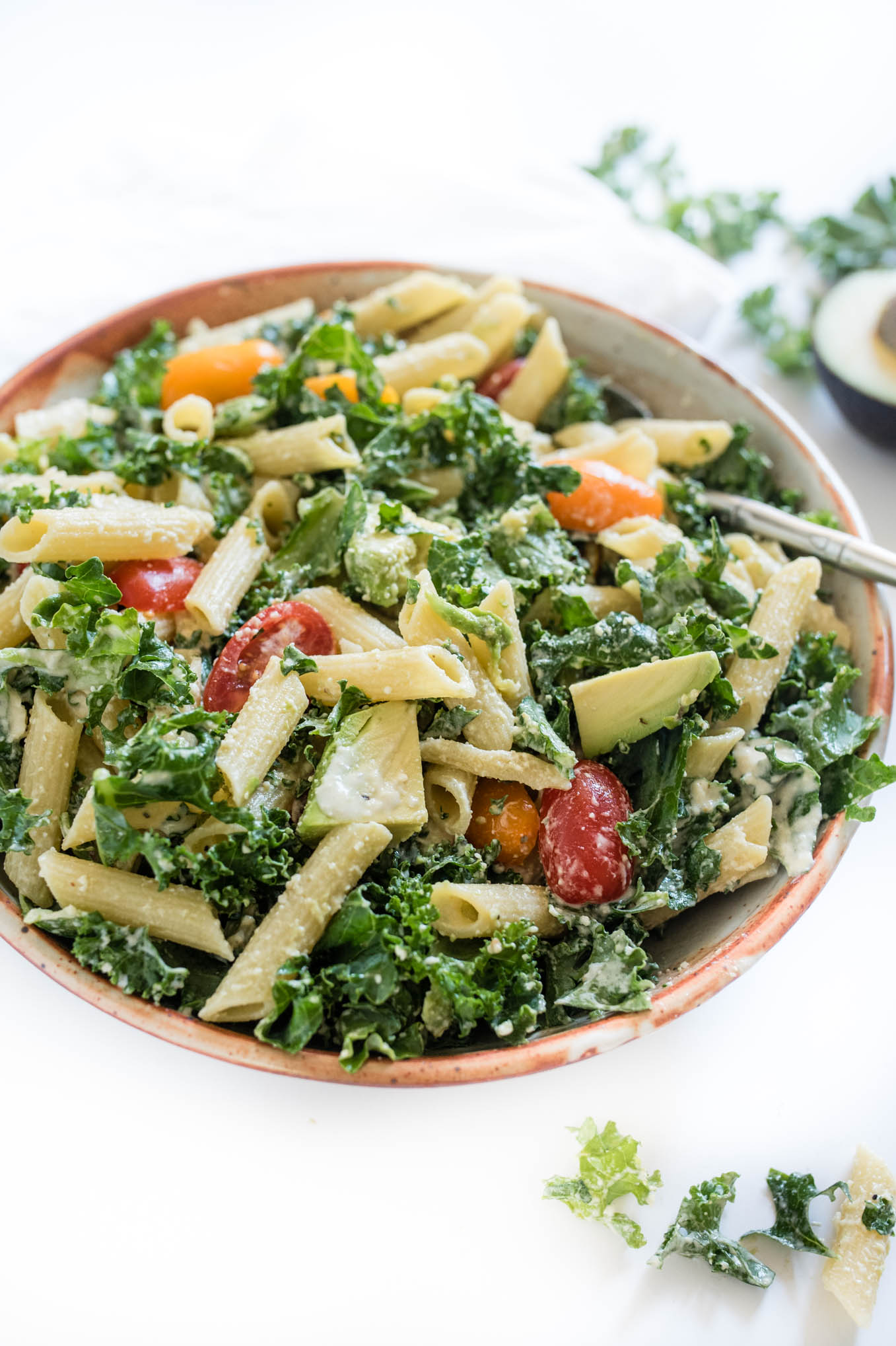 Kale Caesar Pasta Salad is a great vegetarian pasta salad packed with kale, avocado and a simple homemade Caesar dressing. 