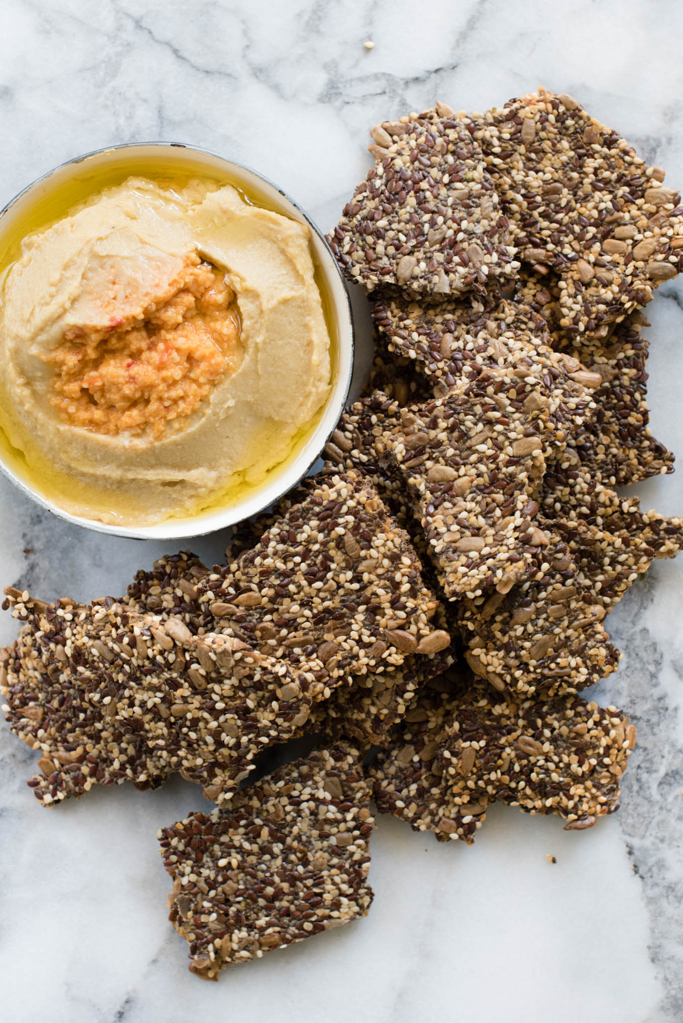 These simple seed crackers will provide a nutritious base for your dipping needs and are gluten and grain free.