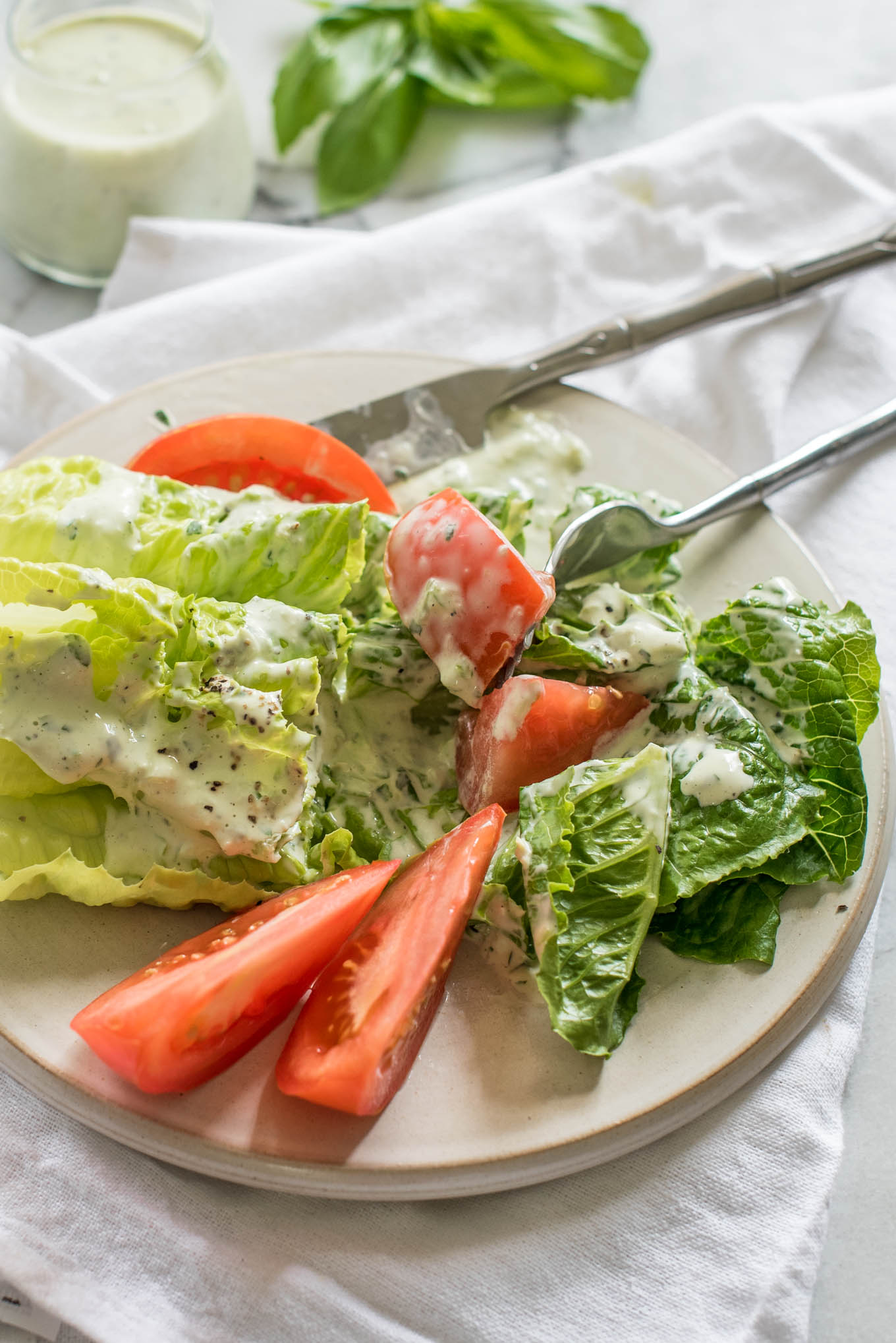 Plate of lettuce and tomatoes 