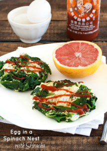 Egg In A Spinach Nest with Sriracha