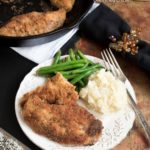 Parmesan and Pecan Crusted Oven Baked Chicken- a lightened up version of some good ol' comfort food | www.nutritiouseats.com