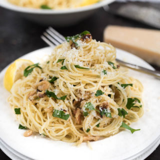 Lemon and Walnut Angel Hair Pasta- ready in less than 15 minutes + vegetarian. A simple weeknight side! | www.nutritiouseats.com