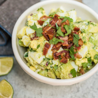 Guacamole Egg Salad tastes like that perfect guacamole recipe only a little heartier with the addition of eggs and bacon. It makes a great dip, sandwich or salad topping.