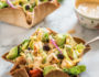 Chicken Taco Salad with Creamy Chipotle Dressing is delicious hearty salad, packed with flavor from the chicken, black beans, avocado and creamy spicy chipotle dressing.