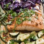 One Sheet Pan Asian Salmon and Veggies is for the healthy conscious salmon lover that wants an easy, tasty and healthy meal.