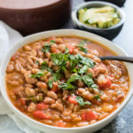 Instant Pot Borracho Beans, aka Frijoles Borrachos or drunken beans (there is beer in the recipe) are the perfect Mexican style beans infused with flavor from the pressure cooker.