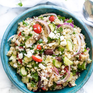 Greek Quinoa Salad is loaded with Mediterranean flavors and is a great make-ahead vegetarian and gluten free salad.