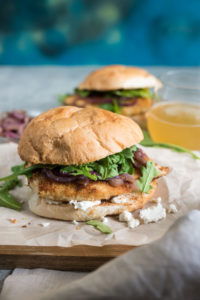 Panko and Almond Crusted Chicken Sandwich with Sautéed Onions, Arugula and Goat Cheese